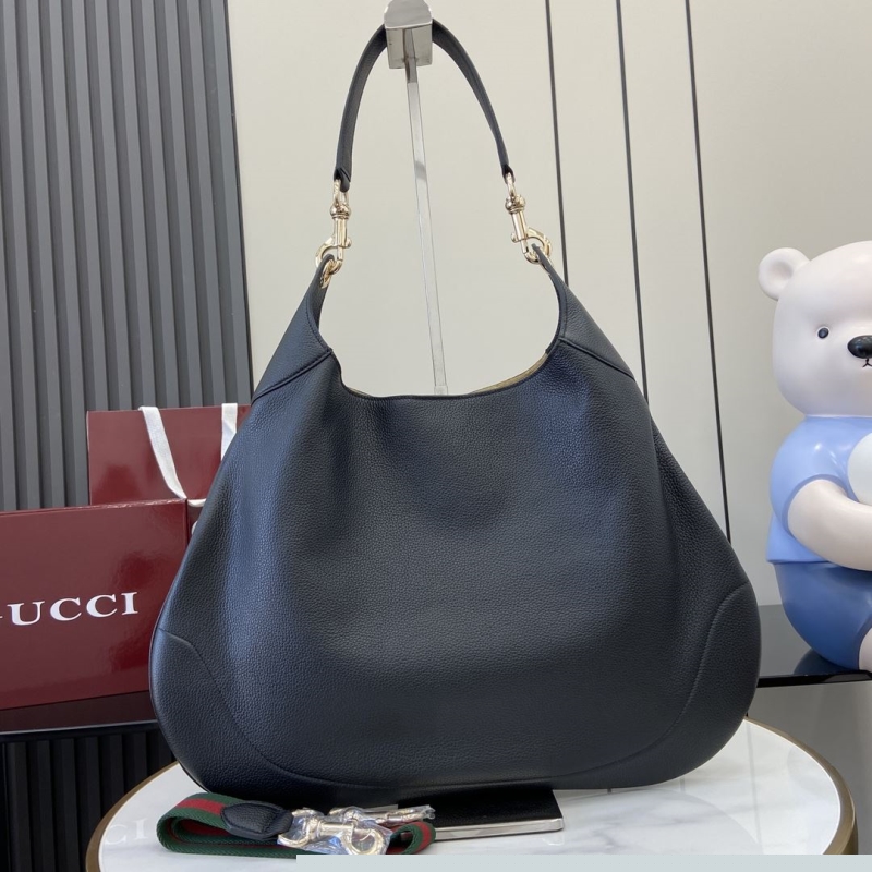 G*u*i top handle bags